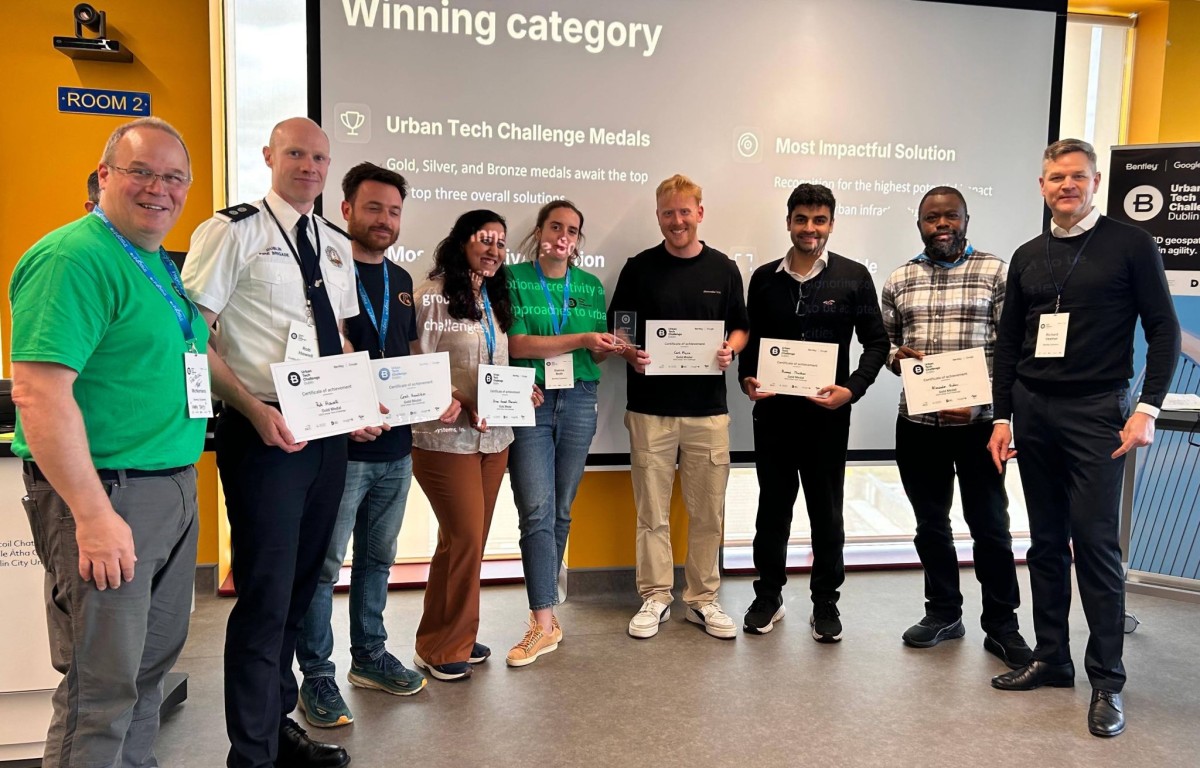 Winning team 'Hackdraft'each holding certificates - 5 men and 2 women 